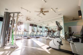 24-Hour fitness center with cardio, free weights, and spin studio